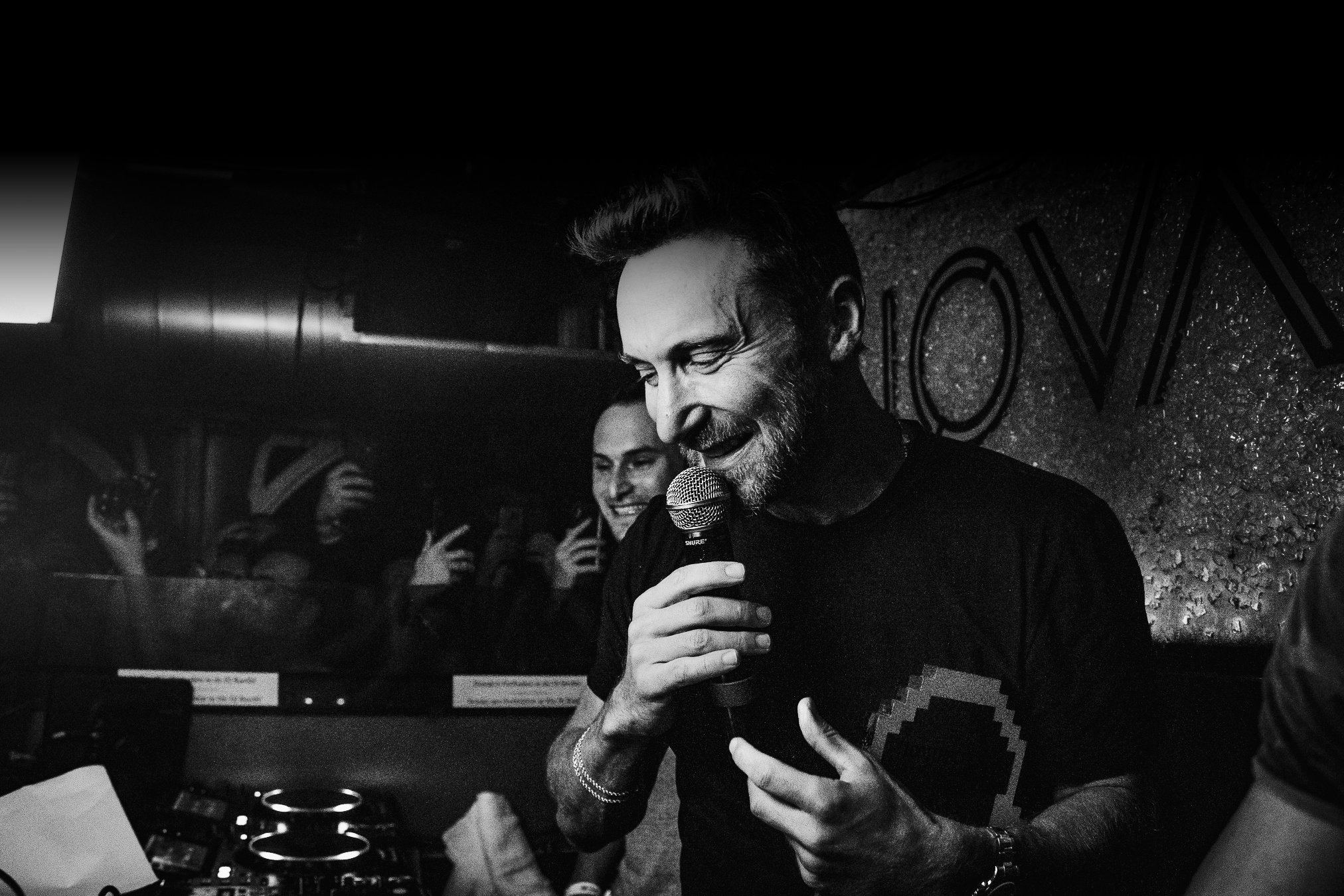 David Guetta holding a Top 101 Producers trophy